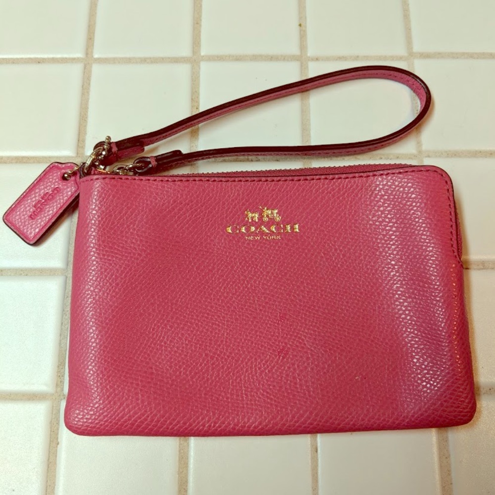 Hot pink Coach wristlet
